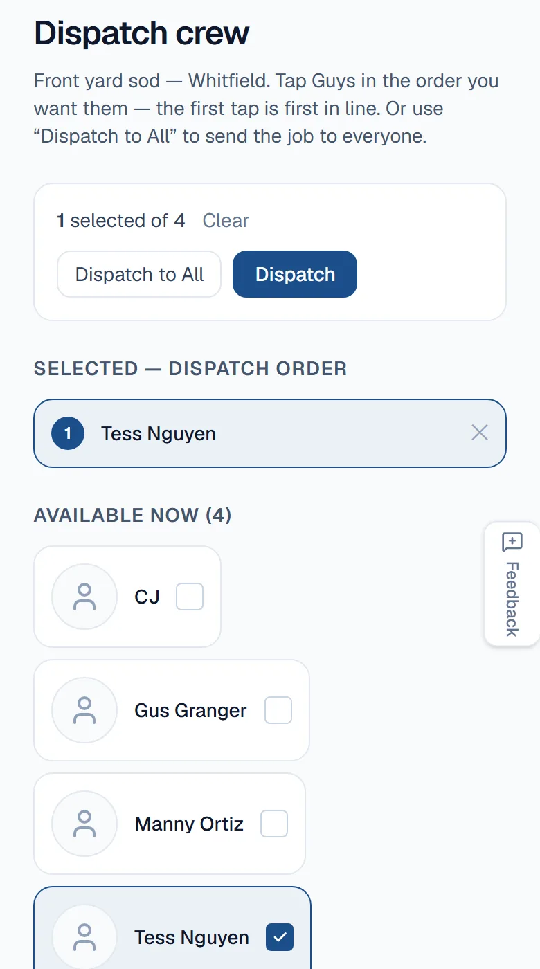 A boss on his phone sending a sod job out: the job named at the top, his crew listed underneath, one man picked, and the Dispatch button ready.